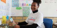 Lisa Mbuyazwe, a tutor at help2read, says some children are shy when it comes to reading aloud, so lessons are about building their confidence as well as their skills. (Photo: Tamsin Metelerkamp)