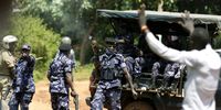Police fire live rounds outside a medical centre where colleagues of Bobi Wine were being treated. (Photo: Getty Images / Getty Images)