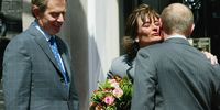 Britain's then prime minister Tony Blair (left) looks on as his wife Cherie Blair (centre) kisses Russian president Vladimir Putin (right) at Downing Street on 26 June 2003 in London. Putin’s visit marked the first state visit to Britain by a Russian leader since 1874, when Tsar Alexander II came to London for the marriage of his daughter to Queen Victoria's second son. (Photo: Scott Barbour / Getty Images)