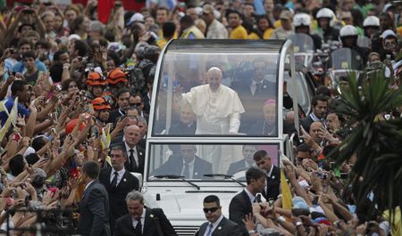 Francis lands in Brazil for first trip abroad as pope