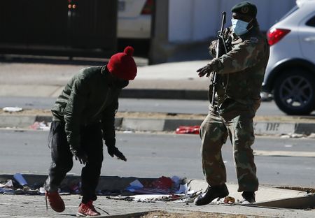 Death toll rising, troops on the ground as looting and burnings continue on Tuesday