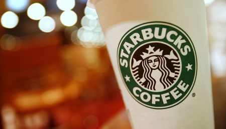 Starbucks bows to pressure on UK tax