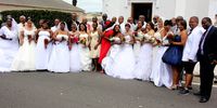 Couples who got married at Robben Island on February 14, 2015 in Cape Town, South Africa. About fifteen couples tied the knot on Valentine’s Day at Robben Island’s Garrison Church. This was the 15th Valentine’s Day wedding service to be held there. (Photo by Gallo Images / Daily Sun / Lindile Mbontsi)