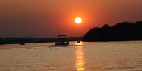 Sunset Cruise, Zambezi River, Zimbabwe. Photographer: Philip Armstrong