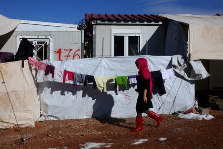 Greece says first migrant dies of Covid-19 since the pandemic