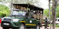 Tourists embark on a game drive in the Kruger National Park. (Photo: Tony Carnie)