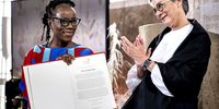 Tsitsi Dangarembga, a writer and filmmaker from Zimbabwe, receives the Peace Prize of the German Book Trade 2021 (Friedenspreis des Deutschen Buchhandels) from Karin Schmidt-Friderichs, head of the German Book association at the Paulus church on October 24, 2021 in Frankfurt, Germany. (Photo: Thomas Lohnes / Getty Images)