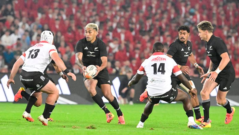 Seven-try All Blacks survive Lions scare to remain unbeaten on tour