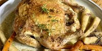 Chicken roasted with parsnips, carrots and thyme