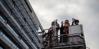epa09669635 The Three Wise Men, Melchor, Gaspar and Baltasar, lifted by a crane, visit the patients of the Ourense University Hospital Complex (CHUO) on Epiphany Day in Orense, Galicia, northwestern Spain, 06 January 2022.  EPA-EFE/Brais Lorenzo