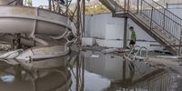 A flooded pool in the aftermath of Hurricane Otis in Acapulco, Guerrero state, Mexico, on Thursday, Oct. 26, 2023. Hurricane Otis left a trail of destruction in Acapulco after tearing into the historic Mexican beach town with wind speeds of 165 miles (266 kilometers) per hour, smashing shops and wrecking apartment buildings and hotels. Photographer: Alejandro Cegarra/Bloomberg via Getty Images
