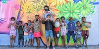 Prince Albert kids in front of a Falko One mural. Image: Chris Marais