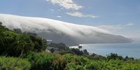 Knysna Lagoon Western Head in Mist. Photographer: Colin