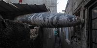 An unexploded missile is seen stuck between two houses of Al Nusairat refugee camp during Israeli operations in the southern Gaza Strip, 17 January 2024. .More than 24,400 Palestinians and at least 1,300 Israelis have been killed, according to the Palestinian Health Ministry and the Israel Defense Forces (IDF), since Hamas militants launched an attack against Israel from the Gaza Strip on 07 October, and the Israeli operations in Gaza and the West Bank which followed it. Since 07 October, up to 1.9 million people, or more than 85 percent of the population, have been displaced throughout the Gaza Strip, some more than once, according to the United Nations Relief and Works Agency for Palestine Refugees in the Near East (UNRWA), which added that most civilians in Gaza are in 'desperate need of humanitarian assistance and protection.  EPA-EFE/MOHAMMED SABER