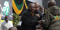 ANC president Cyril Ramaphosa arrives at the conference in Durban with delegates singing the song "wenzen uZuma" as he walks inside the venue. (Photo: Mandla Langa)