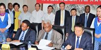  Limpopo Economic Development Agency CEO Ben Mphahlele (centre) flanked by dti deputy general for SEZs Sipho Zikode, and the vice president of the China Huandian Honking Company Li Linwei signing a memorandum of agreement in Beijing in 2018 (Photo: dti)