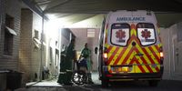 Emergency services personnel help a patient at the Mitchell's Plain District Hospital. (Photo: Leila Dougan)
