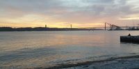 A beautiful sunset in Lisbon at the Tagus River. Photographer: Elvia Els 
