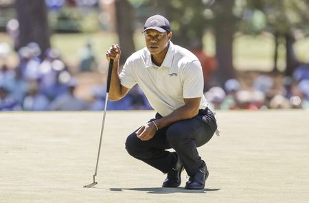 Woods withdraws from Genesis, still dealing with mother's death
