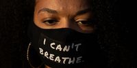 BARCELONA, SPAIN - JUNE 04: A demonstrators wears a protective face mask where it reads 'I can't Breathe' while gathering to mourn the death of George Floyd during a vigil at Catalunya Square on June 04, 2020 in Barcelona, Spain.The death of an African-American man, George Floyd, while in the custody of Minneapolis police has sparked protests across the United States, as well as demonstrations of solidarity in many countries around the world.  (Photo by David Ramos/Getty Images)