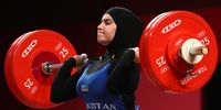 epa09385929 Kumushkhon Fayzullaeva of Uzbekistan competes in the women's 76kg category group A during the Weightlifting events of the Tokyo 2020 Olympic Games at the Tokyo International Forum in Tokyo, Japan, 01 August 2021.  EPA-EFE/HEDAYATULLAH AMID