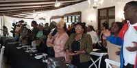Family, friends and community members sing in honour of Fikile Ntshangase at the remembrance ceremony. (Photo: Tony Carnie)