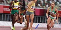 epa09382954 Corinna Schwab of Germany falls during the 4x400m Mixed Relay during the Athletics events of the Tokyo 2020 Olympic Games at the Olympic Stadium in Tokyo, Japan, 31 July 2021.  EPA-EFE/DIEGO AZUBEL