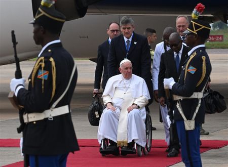 The Day in Pictures: Pope Francis visits Kinshasa, Paris welcomes Ukrainian Defense Minister, and a suicide bomb goes off in Pakistan