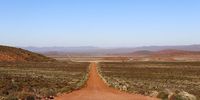 The vast interior region of South Africa, spreading from the west coast to the Northern Cape, is classified as semi-arid drylands and includes the Karoo region, covering approximately 400,000 km². Drylands are characterised by water scarcity, low and erratic rainfall, heatwaves, and occasional floods. (Photo: Kristin Engel)