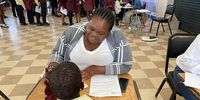 A child being signed in for a health check at Bizana. (Photo: Sue Segar / Spotlight)
