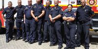 At Hout Bay Fire Station, (from left) Luton Grobbelaar, divisional commander with Cape Town Fire and Rescue Service; Nigel Janson, firefighter; Sean Evans, senior firefighter; Faeem Sonday, firefighter; Abraham Pockpas, firefighter; Paul Nefdt, firefighter; Zulpha Slamdien, firefighter; and Wayne Gertse, firefighter. 15 October 2025 (Tamsin Metelerkamp)
