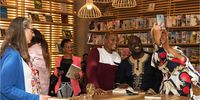 Taruvinga poses with audience members after the launch of his book at Exclusive Books in Rosebank Mall, Johannesburg on 3 October 2019. Photo: Supplied.