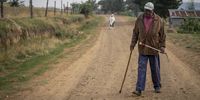 A voter makes his way to Mokema Primary School on the outskirts of Maseru ahead of casting his vote. 7 October 2022.<br>Photo: Shiraaz Mohamed.