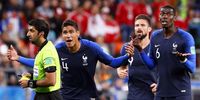 Paul Pogba (R) of France reacts after being booked by referee Mohammed Abdulla Mohammed (L) of the UAE during the FIFA World Cup 2018 group C preliminary round soccer match between France and Peru in Ekaterinburg, Russia, 21 June 2018.  EPA-EFE/FRANCIS R. MALASIG 