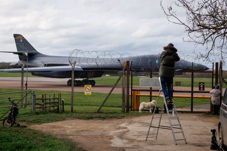 UK counter-terror police question five men held at airbase used by US to attack Iran