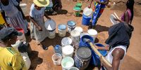 Residents of Mandela Village, Hammanskraal, collecting water from a communal water tanker. (Photo: Alet Pretorius)