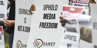Participants in a SA National  Editors’ Forum picket in protest against the Zuma private prosecution outside the High Court in Pietermaritzburg on 22 March 2023. (Photo: Gallo Images / Darren Stewart)