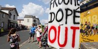 A sign reading 'Doped Froome out' is seen on the side of the road during the 2nd stage of the 105th edition of the Tour de France cycling race over 182.5km between Mouilleron-Saint-Germain and La Roche-Sur-Yon, France, 08 July 2018.  EPA-EFE/SEBASTIEN NOGIER