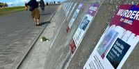 Posters commemorating Palestinians killed in the war have been placed on the Sea Point beachfront. (Photo: Matthew Hirsch)
