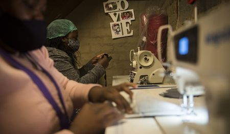 Mask factory helps flatten the jobless and Covid-19 curves