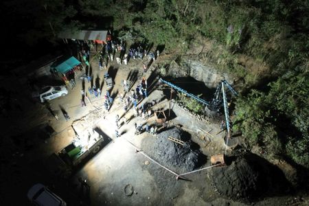 One body recovered from flooded Indian mine as rescuers search for trapped men
