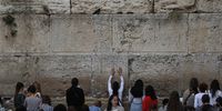 epa09469412 Ultra-Orthodox Jewish women pray at the Western Wall in Jerusalem?s old city on the eve of the Jewish Holiday of Yom Kippur, 15 September 2021. Yom Kippur is the Day of Atonement, which counts as the holiest day for the Jews calendar. It begins at sundown on 15 September and ends at sundown on 16 September, when the entire country comes to a standstill as people fast and spend much of the day in prayer.  EPA-EFE/ATEF SAFADI