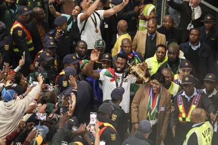 Boks reignite hopes of a united South Africa as thousands gather to welcome world champs home