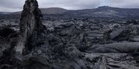 The still-hot, solid lava field lies under Fargradalsfjall volcano on August 19, 2021 near Grindavik, Iceland. The volcano, which erupted in March of this year and is located only a short drive from Iceland's main international airport, has become a major tourist attraction. Image: Sean Gallup / Getty Images