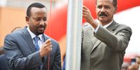 epa06893032 Ethiopia's Prime Minister Abiy Ahmed (L) and Eritrea's President Isaias Afwerki (R) attend the re-opening of the Eritrean embassy in the Ethiopian capital Addis Ababa, Ethiopia, in a brief ceremony 16 July 2018. The leaders declared their 'state of war' over one week ago and Isaias spent the weekend in Ethiopia. Eritrea reopened its embassy in Ethiopia 16 July in further evidence of a rapid thaw between two countries that a week ago ended two decades of military stalemate over a border war in which tens of thousands died.  EPA-EFE/STRINGER