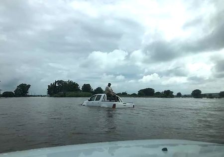 Flooding cuts off schools as North West scrambles to contain damage