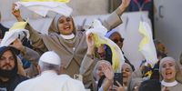 Pope Francis (front) is cheered by an enthusiastic nun as he arrives in his 'popemobil' for the weekly general audience at St. Peter Square, Vatican, 08 November 2023.  EPA-EFE/FABIO FRUSTACI