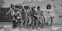 American funk rock band Funkadelic pose with singer Carol King (right) in front of the Albert Memorial in Kensington Gardens, London, UK, May 1971.  (Photo by Evening Standard/Hulton Archive/Getty Images)