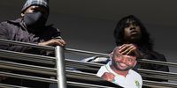 Supporters waving South African flags and holding placards during the South Africa men's national cricket team arrival at OR Tambo International Airport on June 18, 2025 in Johannesburg, South Africa. (Photo by Gallo Images/Alet Pretorius)