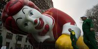 NEW YORK, NY - NOVEMBER 27: The Ronald McDonald balloon is kept under a net during the inflation process on November 27, 2019 in New York City. Winds could ground the giant balloons, according to city regulations, giant balloons cannot fly with gusts winds above 34 m.p.h. (Photo by Eduardo Munoz Alvarez/Getty Images)